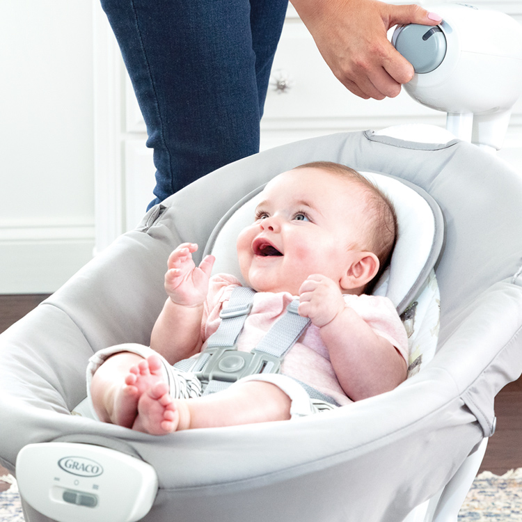 Little baby enjoying relaxing in Graco's Duet Sway