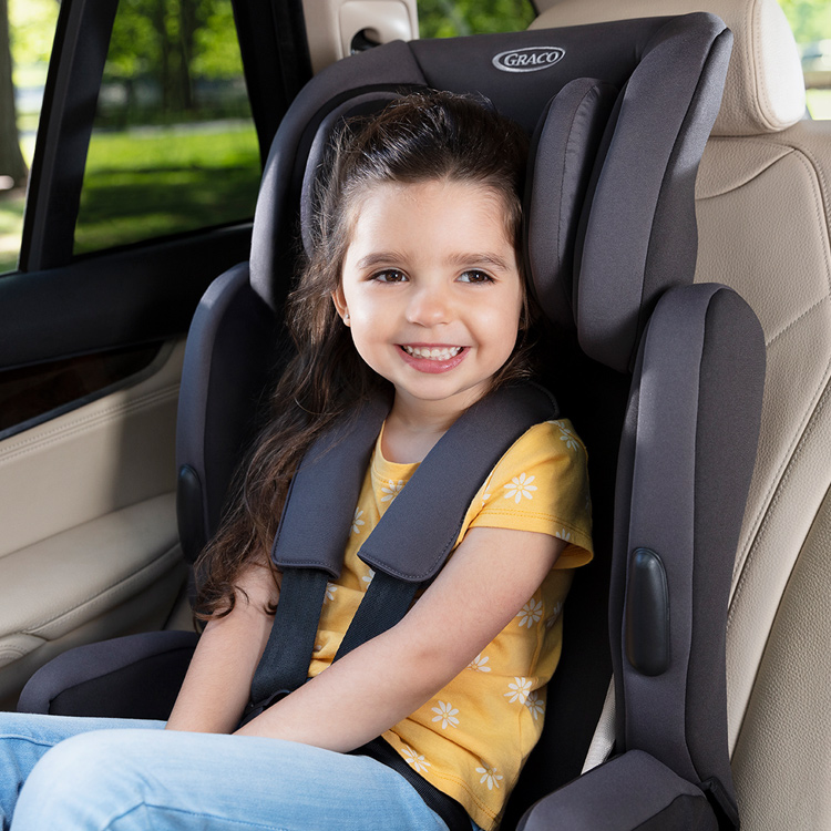 Little girl sitting forward facing in Graco Endure car seat