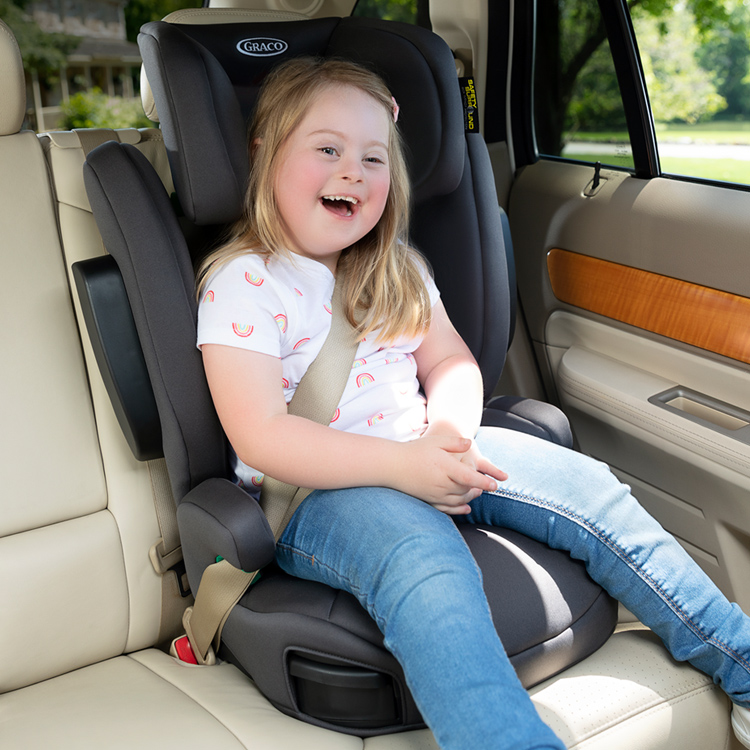 Little girl sitting on Graco EverSure car seat with memory foam padding