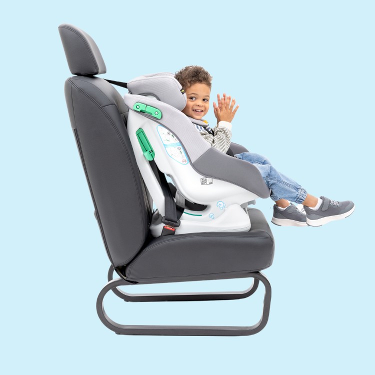 Little boy sitting rearwarding facing in the Graco Extend LX R12