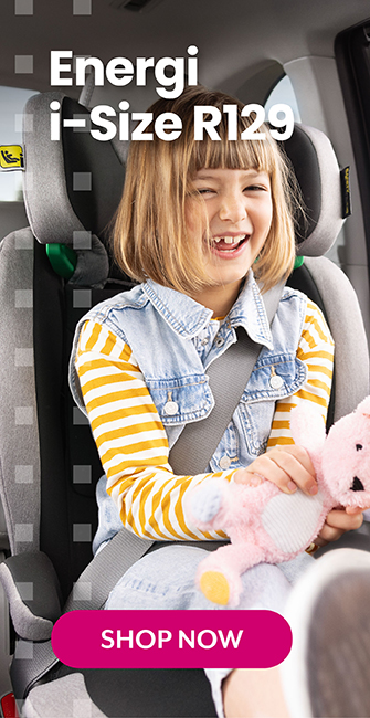 Baby boy laughing and buckled in to Graco Turn2Me Grow i-Size R129