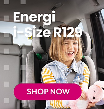 Baby boy laughing and buckled in to Graco Turn2Me Grow i-Size R129