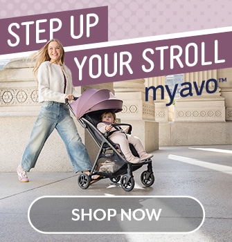 Mum smiling and pushing Graco Myavo with toddler buckled in.