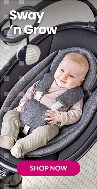 Baby boy smiling and buckled in to Graco Eluma Sway and interacting with Mum.